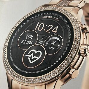 Brand new Michael Kors Rose Gold smart watch with diamond settings.
